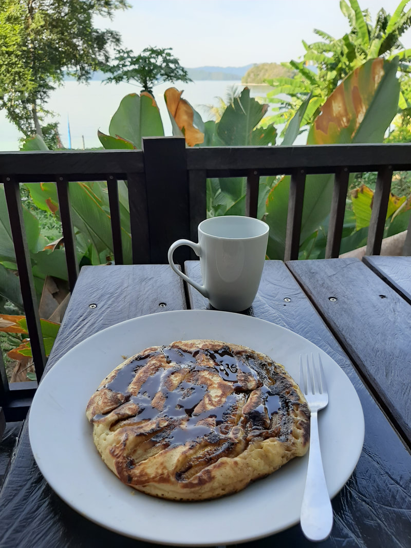 Coffee & Banana pancake breakfast with ocean view