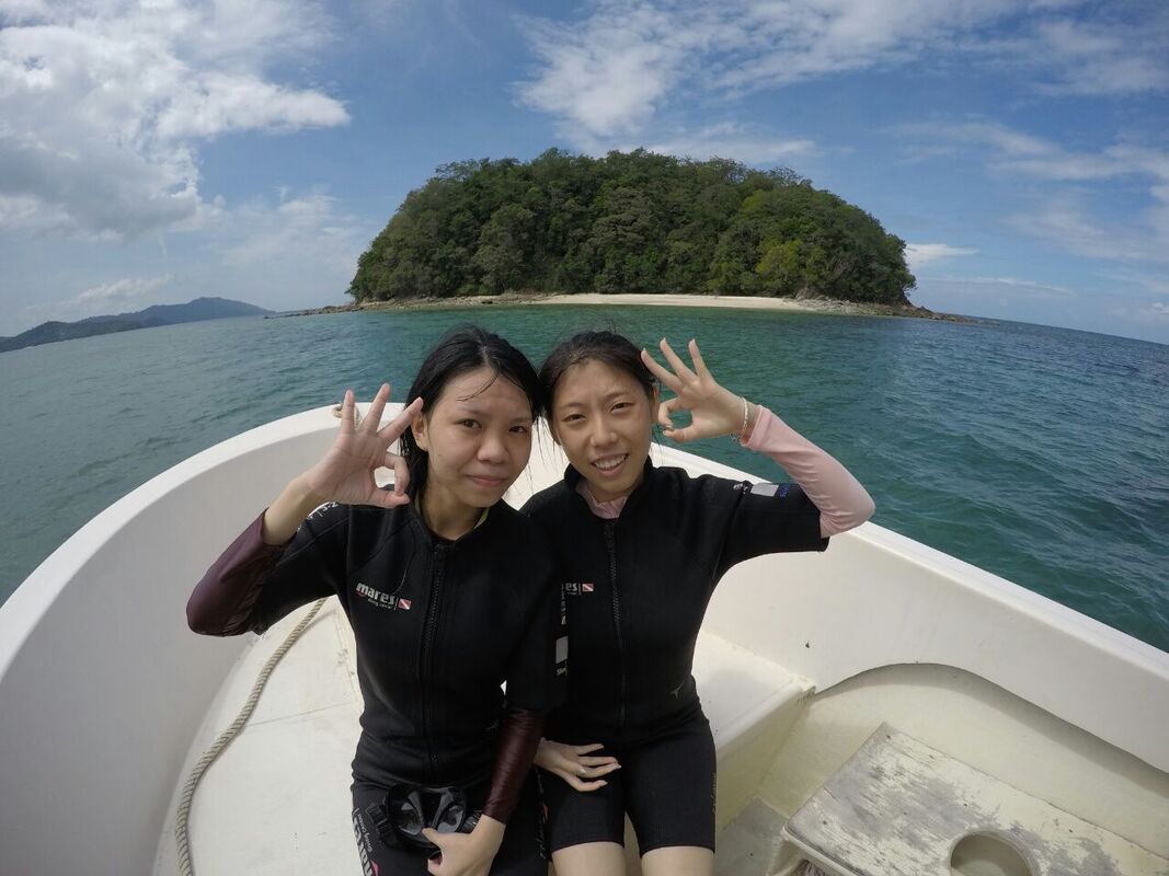 Beginner discover scuba divers at Pandan Island Kota Belud Sabah Borneo