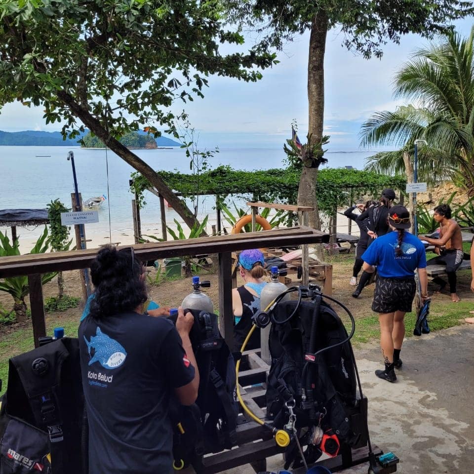 Preparing dive equipment at Bigfin divers Kota Belud Sabah Borneo