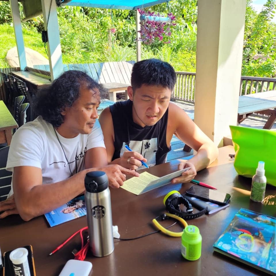 Studying for PADI Open water course at Bigfin divers Sabah Borneo
